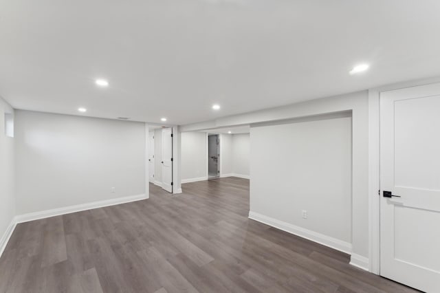 basement with wood-type flooring