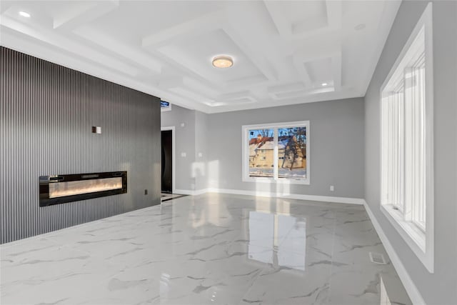 unfurnished living room with coffered ceiling