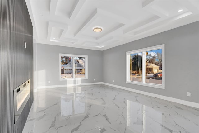 empty room with coffered ceiling