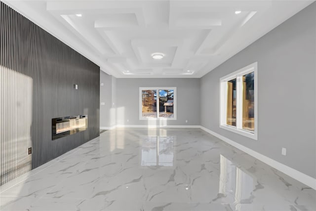 unfurnished living room with coffered ceiling