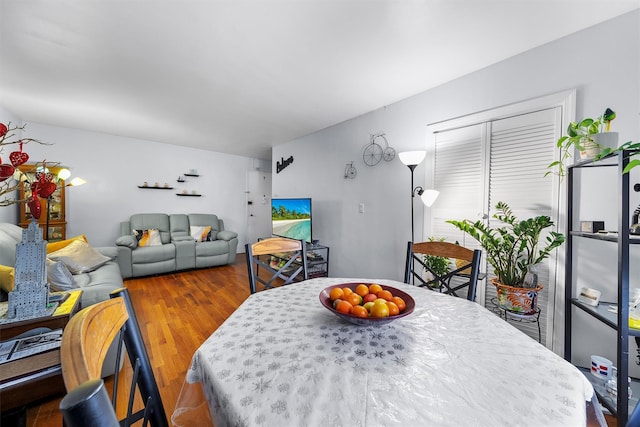 dining area featuring hardwood / wood-style flooring