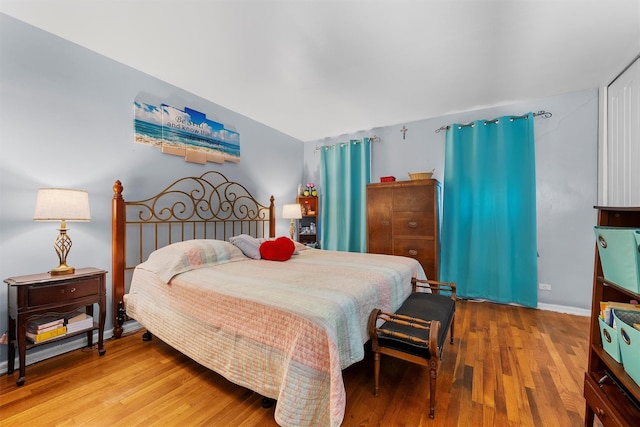 bedroom featuring hardwood / wood-style floors