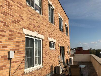 view of home's exterior featuring brick siding