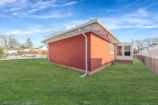 exterior space with a lawn