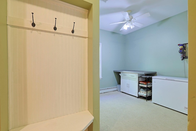 mudroom featuring a baseboard heating unit, light colored carpet, and ceiling fan