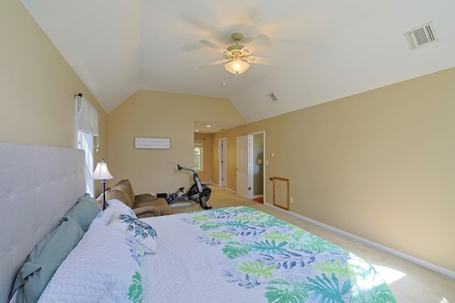 carpeted bedroom featuring vaulted ceiling and ceiling fan