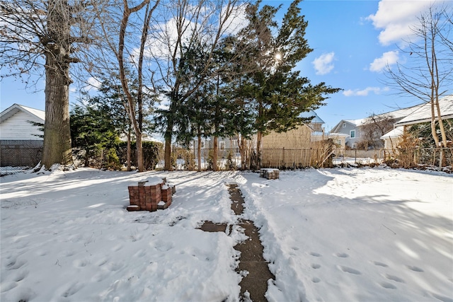 view of yard covered in snow