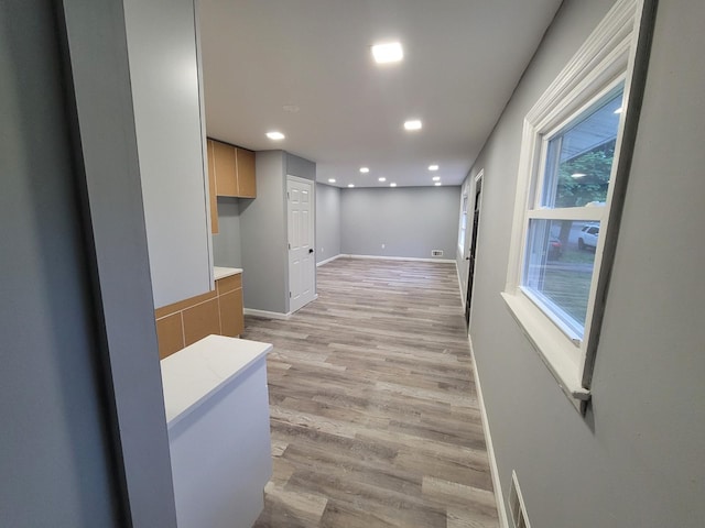 hall featuring light wood-type flooring