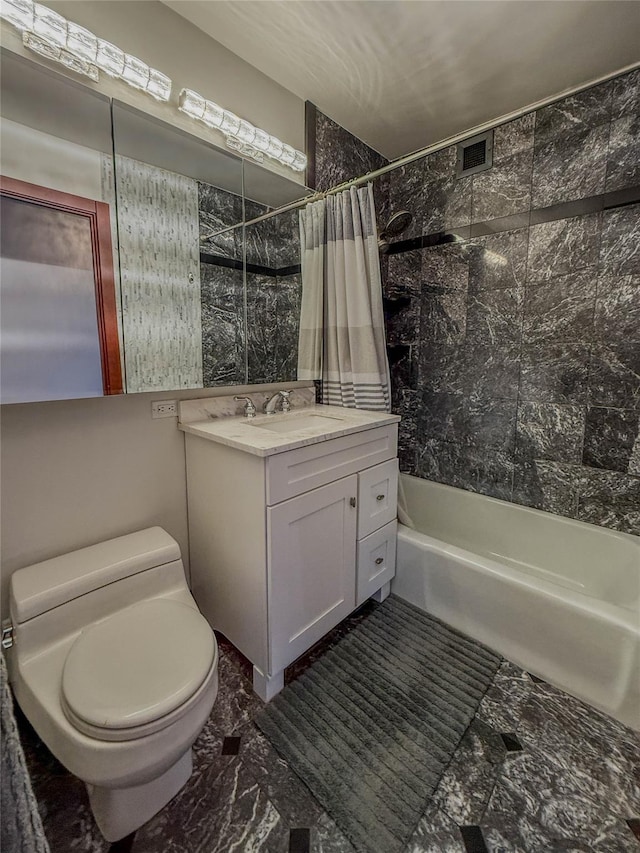 full bathroom with vanity, toilet, and shower / bath combo with shower curtain