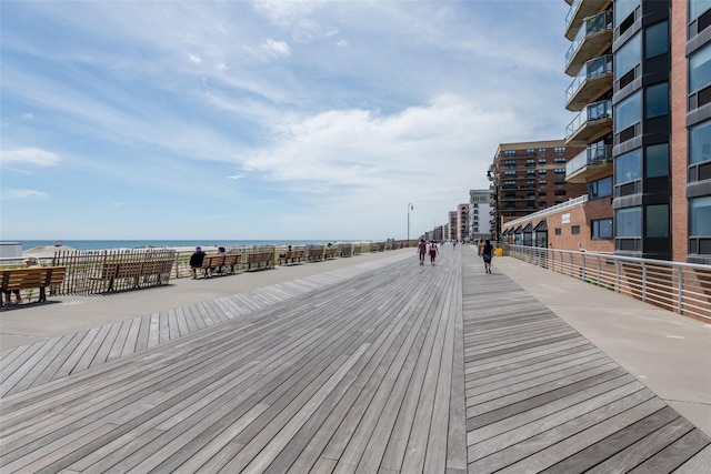 surrounding community featuring a water view