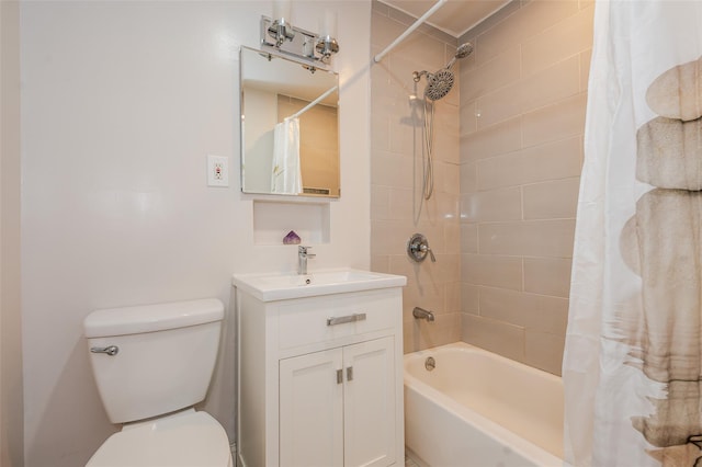 full bathroom featuring vanity, toilet, and shower / bath combo with shower curtain