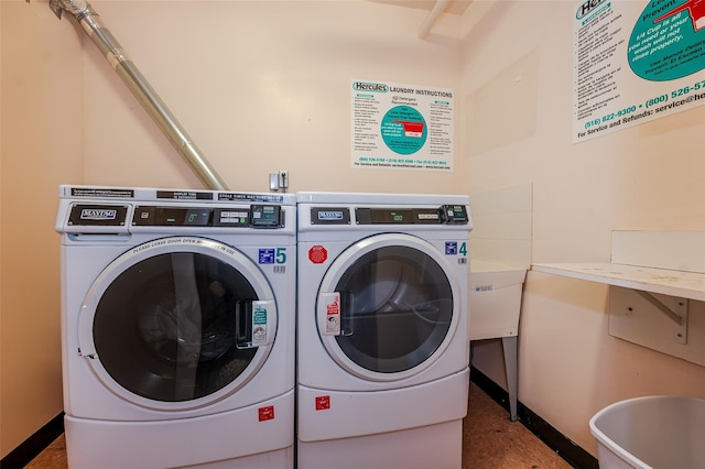 laundry room featuring independent washer and dryer