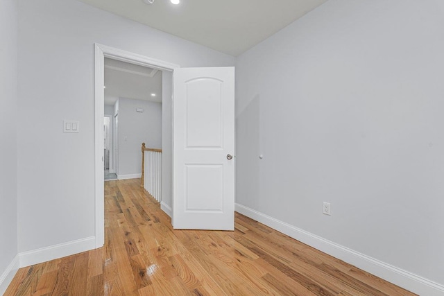 empty room with light wood-type flooring