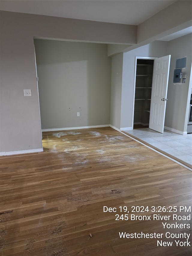 empty room with wood-type flooring