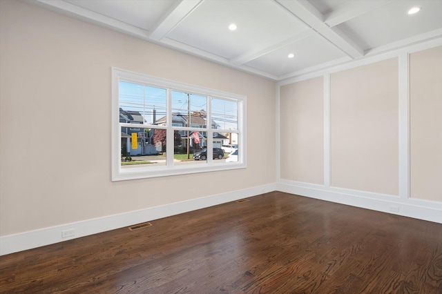 unfurnished room featuring wood-type flooring, coffered ceiling, and beamed ceiling