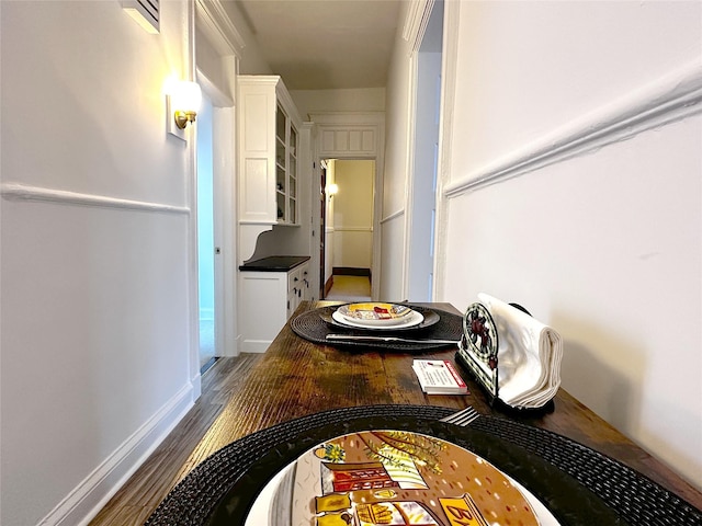 hallway featuring hardwood / wood-style flooring