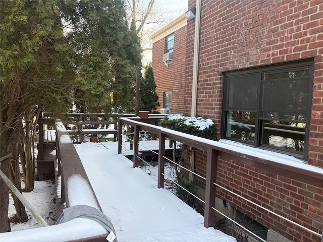 view of snow covered deck