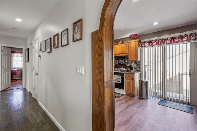 hall featuring dark wood-type flooring