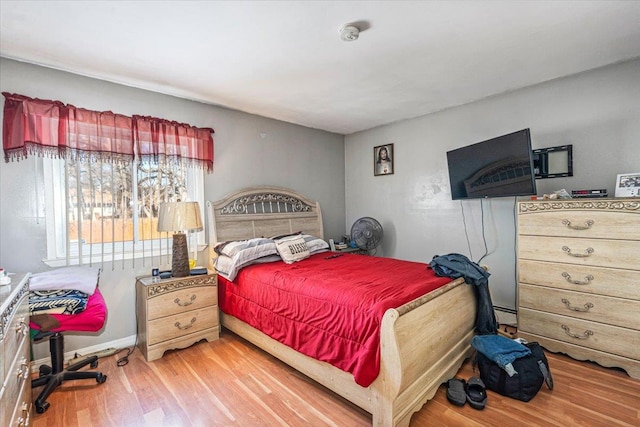 bedroom featuring wood-type flooring