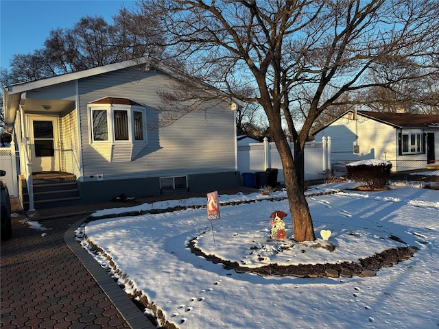 view of snow covered property