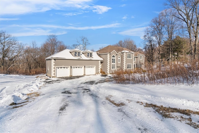 view of front of home featuring a garage