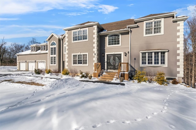 view of front of home with a garage