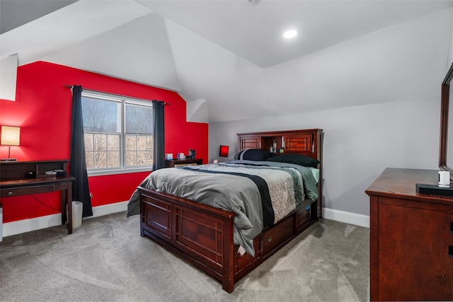 carpeted bedroom with vaulted ceiling