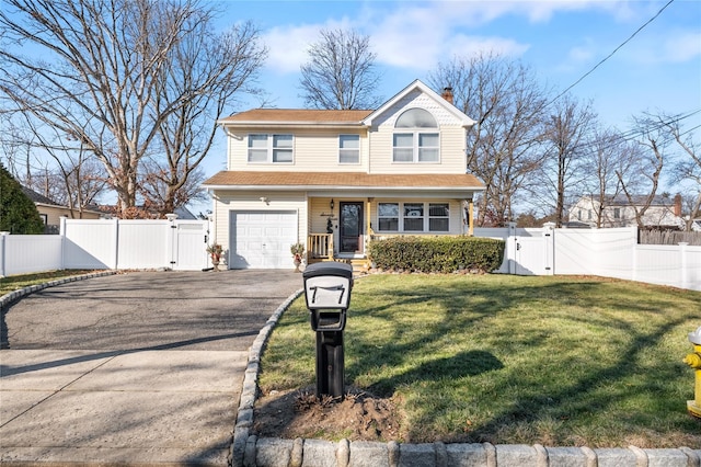 front of property featuring a porch, a garage, and a front yard