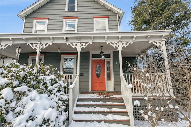 view of front of property featuring covered porch