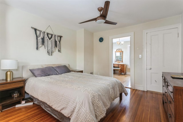 bedroom featuring dark wood-type flooring and ceiling fan