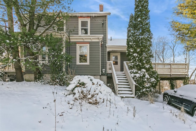 view of front of home with a wooden deck