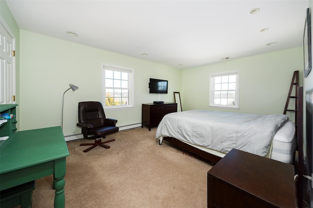 bedroom featuring light carpet, multiple windows, visible vents, and baseboard heating