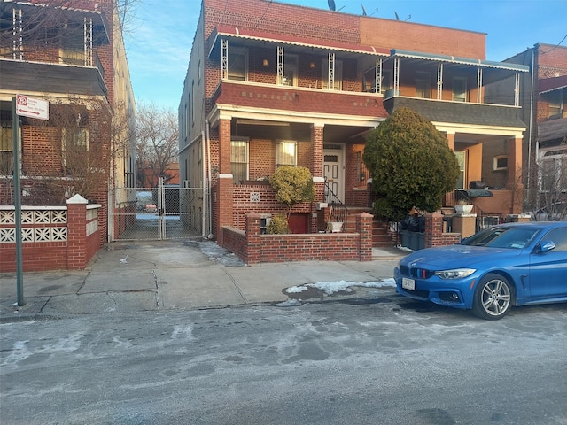 view of front of property with a balcony