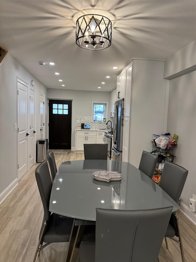 dining space featuring light hardwood / wood-style flooring