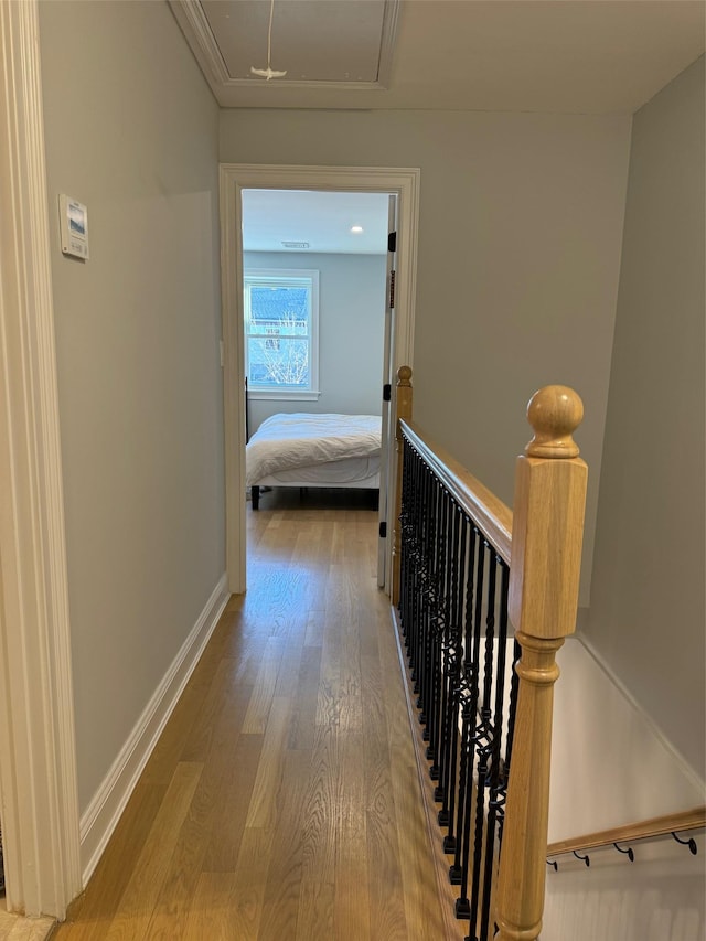 corridor featuring wood-type flooring