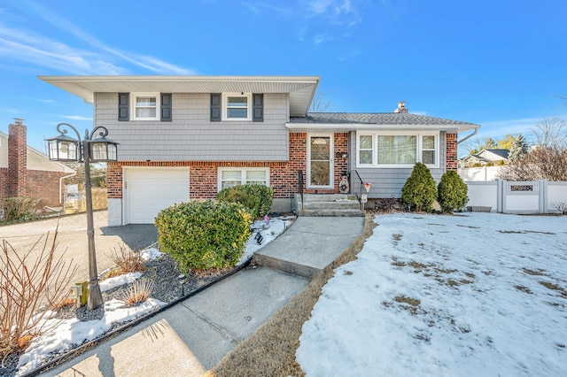 split level home featuring a garage