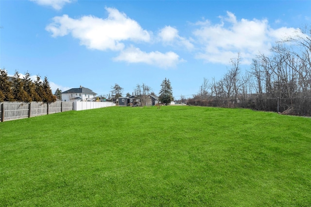 view of yard featuring fence