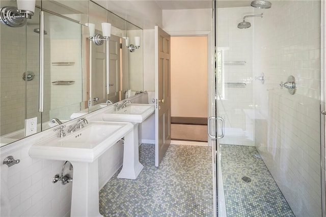 42 Masterton Rd, Bronxville, NY 10708 - full bathroom featuring tile patterned floors, a shower stall, and a sink