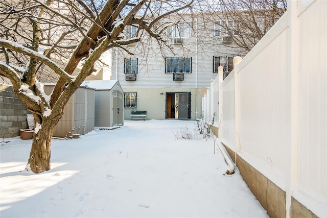 view of yard covered in snow