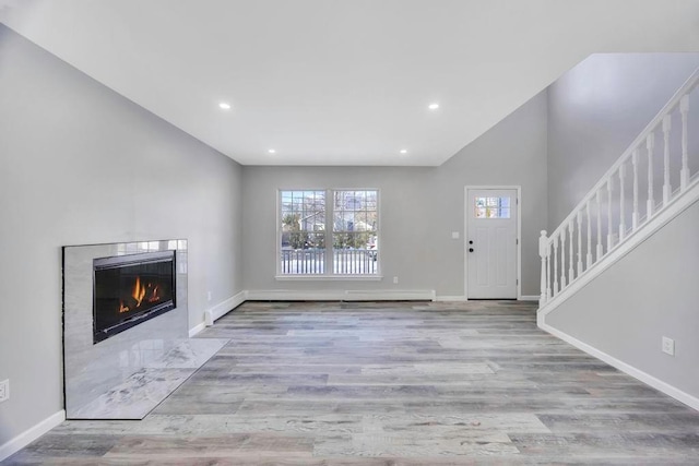 foyer entrance with light hardwood / wood-style flooring