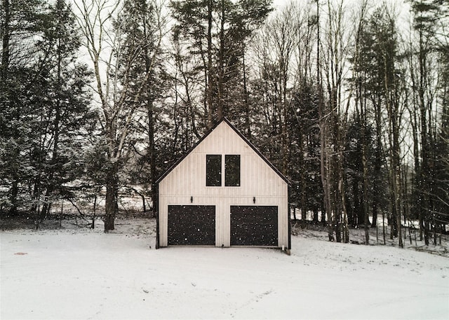 view of snow covered garage