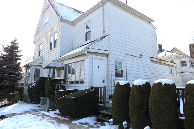 view of snow covered property