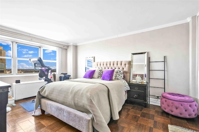 bedroom featuring ornamental molding and dark parquet floors