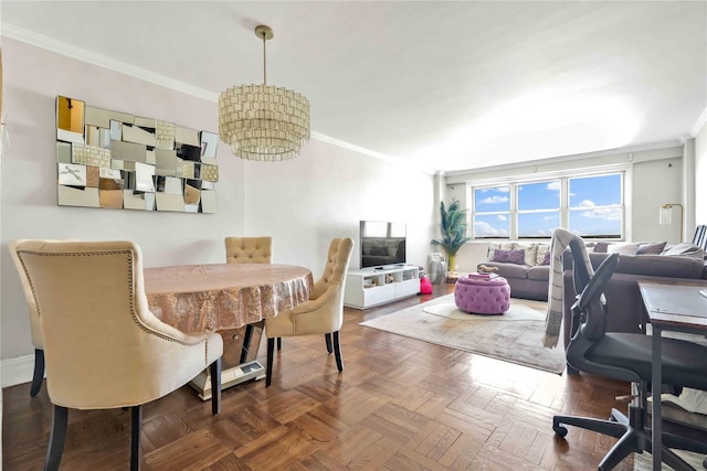 dining room featuring crown molding, an inviting chandelier, and dark parquet floors