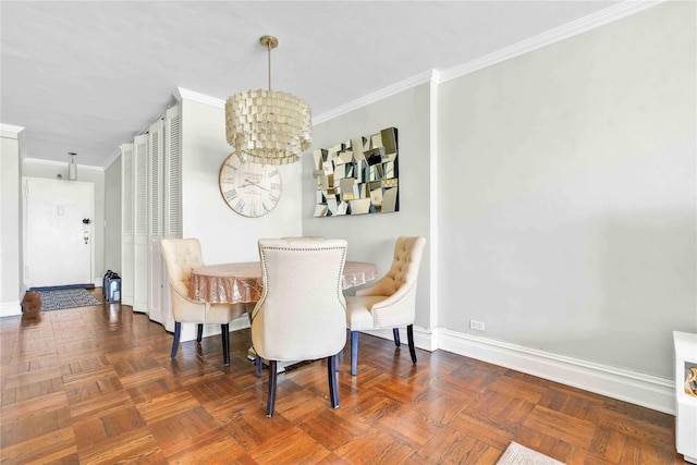 dining space with crown molding, a notable chandelier, and dark parquet flooring