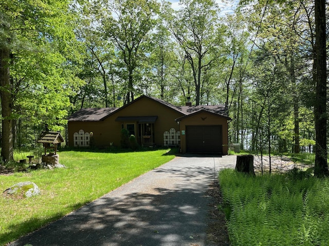161 Barker Rd, Glen Spey, NY 12737 - view of front of property featuring a garage, driveway, a front yard, and a chimney
