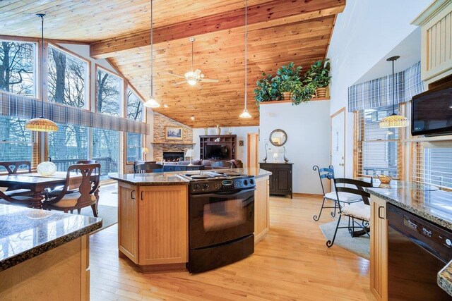 161 Barker Rd, Glen Spey, NY 12737 - kitchen with black appliances, high vaulted ceiling, light wood-style flooring, beam ceiling, and a center island