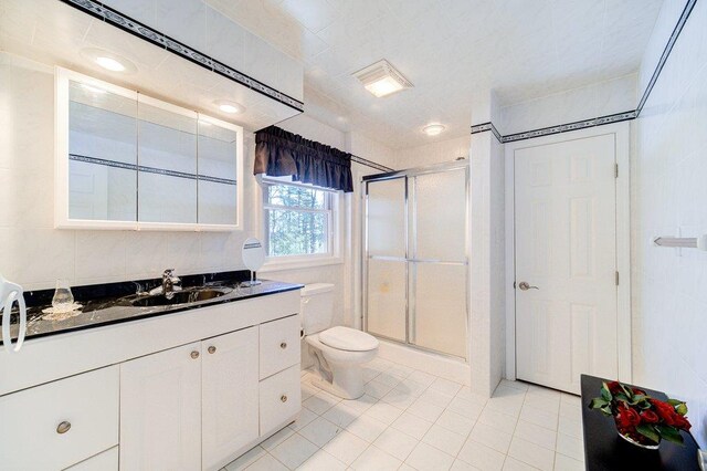 161 Barker Rd, Glen Spey, NY 12737 - bathroom with tile patterned flooring, a stall shower, toilet, and vanity