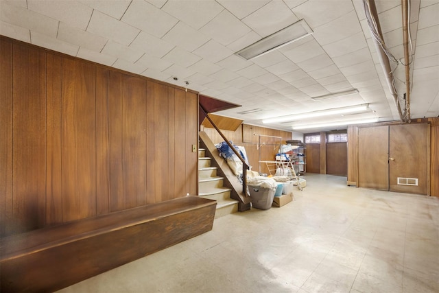 basement with wooden walls