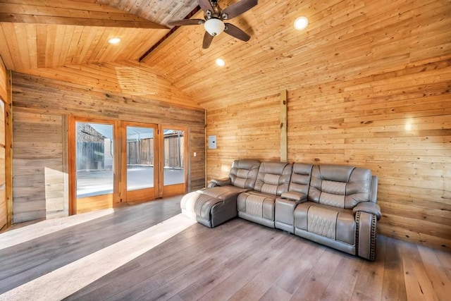 living room with wood ceiling, ceiling fan, hardwood / wood-style floors, high vaulted ceiling, and wood walls